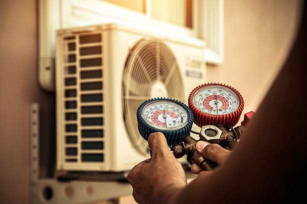 Professional Heat Pump Repair technician working in Bluffton, IN